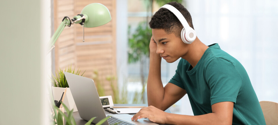 Person wearing headphones and working at a laptop, pictured in The Register's CLOSEDQUORUM report.
